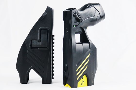 comprar HUSHA TX200P pistola de aturdimiento de doble cartucho con IP57 resistente al agua y 55KV de salida de voltaje para la aplicación de la ley Fabricación en línea