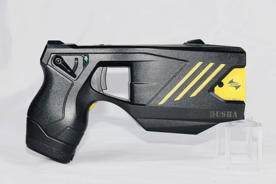comprar HUSHA TX200P Dual cartuchos Pistola aturdidora con IP57 impermeable y 55±5KV de voltaje de salida para uso táctico Fabricación en línea